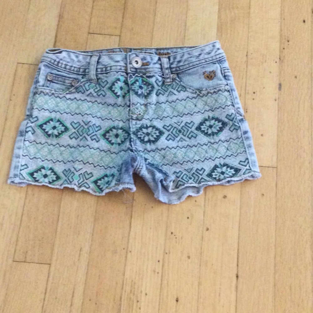 Patterned denim justice shorts.